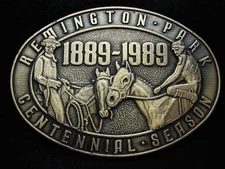 PD27173 *NOS* VINTAGE 1989 *REMINTON PARK CENTENNIAL SEASON* HORSE RACING BUCKLE