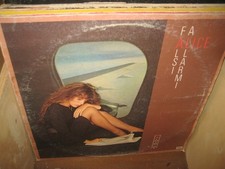 VENDO ìN BLOCCO CIRCA 8O VINILI 33 GIRI  VARI CANTANTI