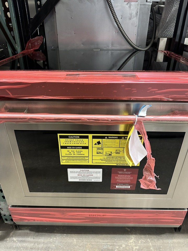 New, Display model Wolf Range 36” electric Oven, induction burners