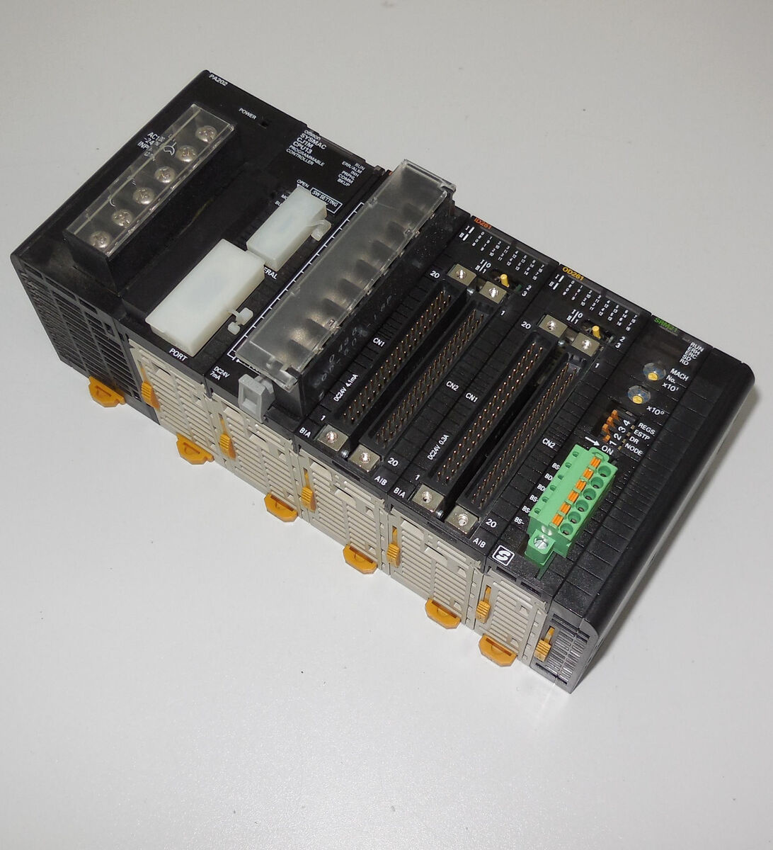 Omron CJ1W-PA202 CJ1W-CPU13 ID211 ID261 OD261 CJ1W-SRM21 PLC Omron CJ1W-PA202 CJ1W-CPU13 ID211 ID261 OD261 CJ1W-SRM21 PLC