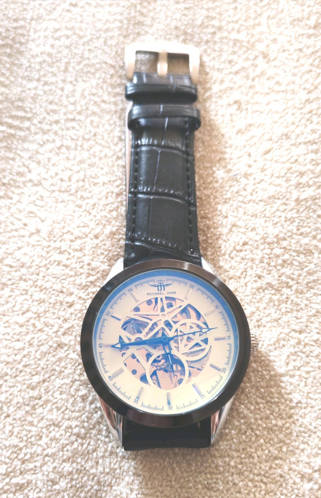 Montre automatique squelette Michael John homme mécanique avec cadran transparent argenté