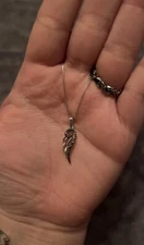 1/20 Carat Total Weight Black Diamond, Angel Wing Pendant in Sterling Silver!