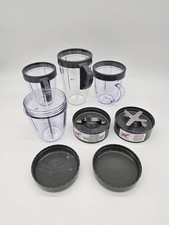 4 Magic Bullet Replacement Cups, 3 Grey Rings, 2 Blades, 2 Lids Pre-Owned Unused