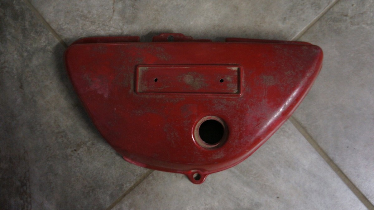 Suzuki TS125 nos L/H side cover in red 1973 p.n. 47211-28600-293