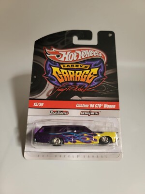2009 HOT WHEELS LARRY'S GARAGE CUSTOM '66 GTO WAGON PURPLE 15/39