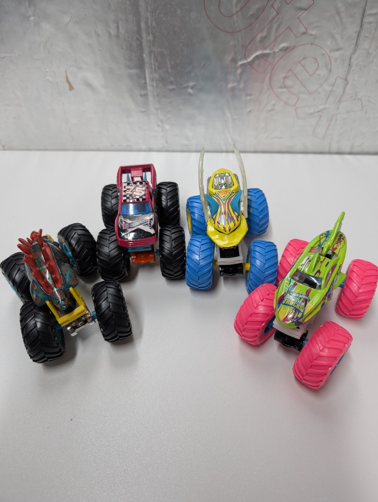 Hot Wheels Monster Trucks Lot of 4 Motosaurus Shark Wreak Glow In Dark 1:64