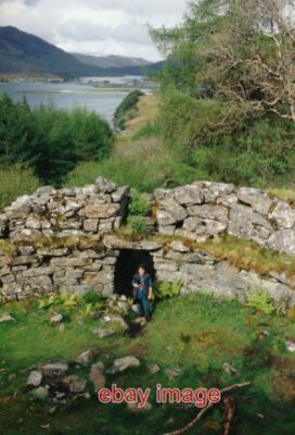 PHOTO  THE BROCH AT TOTAIG THE REMAINS OF A BROCH AT THE FOOT OF A LONG AND SLIP