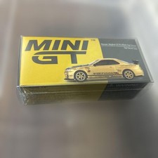 MINI GT 1/64 Nissan GT-R R34 Top Secret Gold