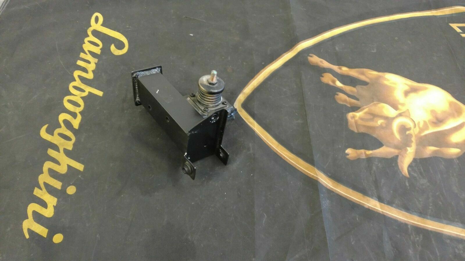 LAMBORGHINI GALLARDO REAR LEFT BUMPER EXHAUST MOUNTING BRACKET OEM 400813729