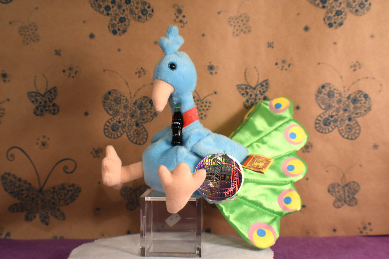 Coca Cola Plush Beanie Peacock  holding a Coke Bottle 1999
