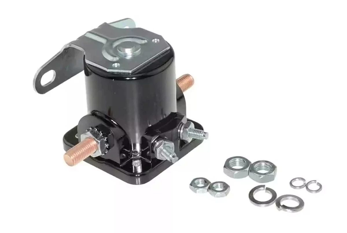 A solenoid for a 1975-1985 Ford F-150 pickup truck, with nuts and washers, displayed on a white background.