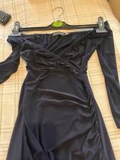 Off the shoulder long sleeved Dress