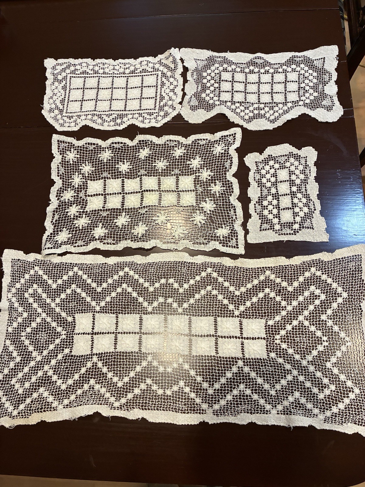 Antique knot filet lace table runner and doily set, five pieces, circa 1900