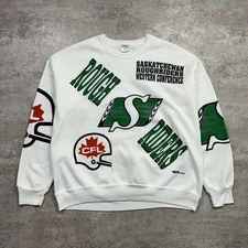 VTG 90s CFL SASKATCHEWAN ROUGHRIDERS AOP SWEATSHIRT RAVENS Sz XL MADE IN CANADA