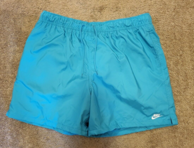 nike woven shorts dusty green