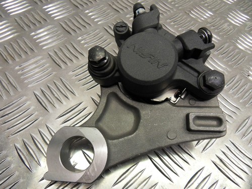 Genuine Yamaha YZF R1 NISSIN Rear brake caliper and carrier 2007 to 2014 - Picture 1 of 5