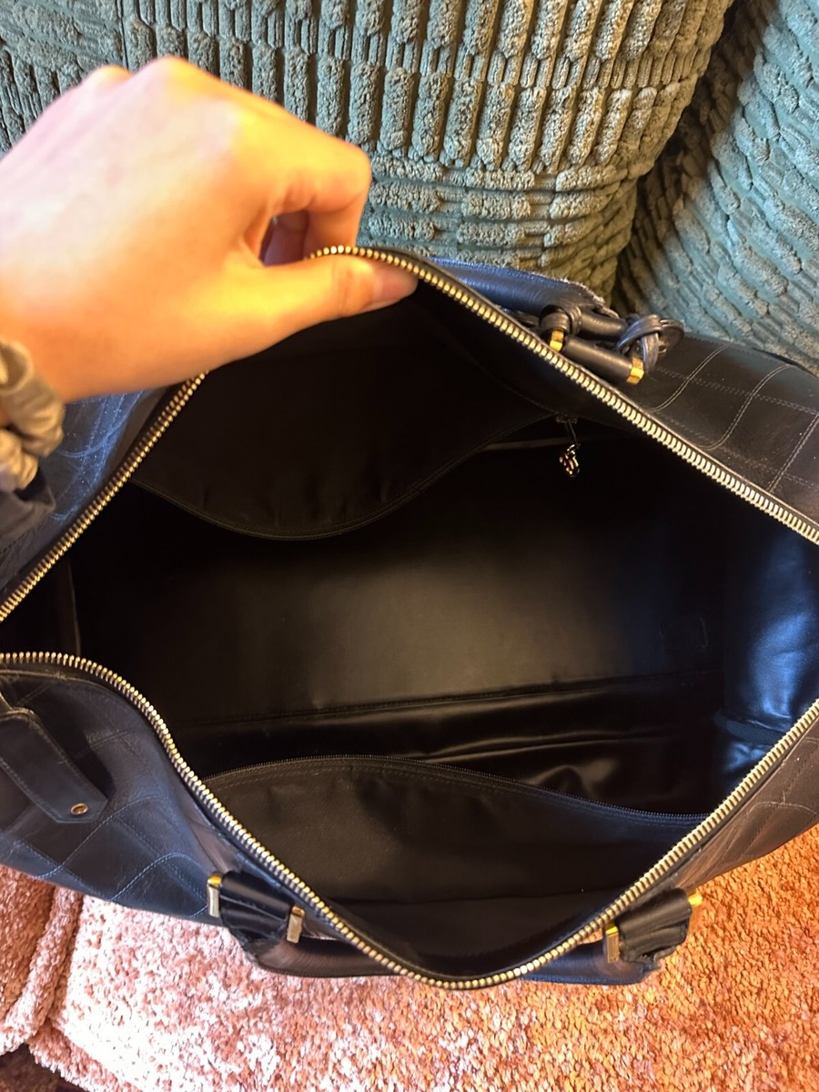 Authentic Chanel Black Quilted Lambskin Boston Duffle Bag with