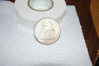 1877 SILVER TRADE DOLLAR 900 FINE AND FINE CONDITION