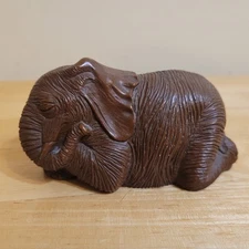 Vintage Red Mill Mfg USA SLEEPING ELEPHANT Wood Pecan Shell Figurine Signed 1990