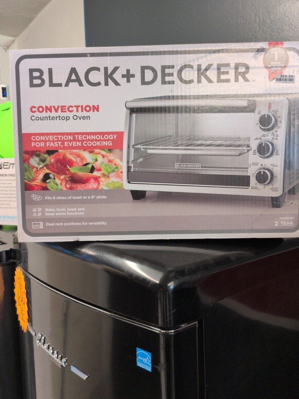 This is a Black & Decker Convection Countertop Oven designed to hold up to 6...