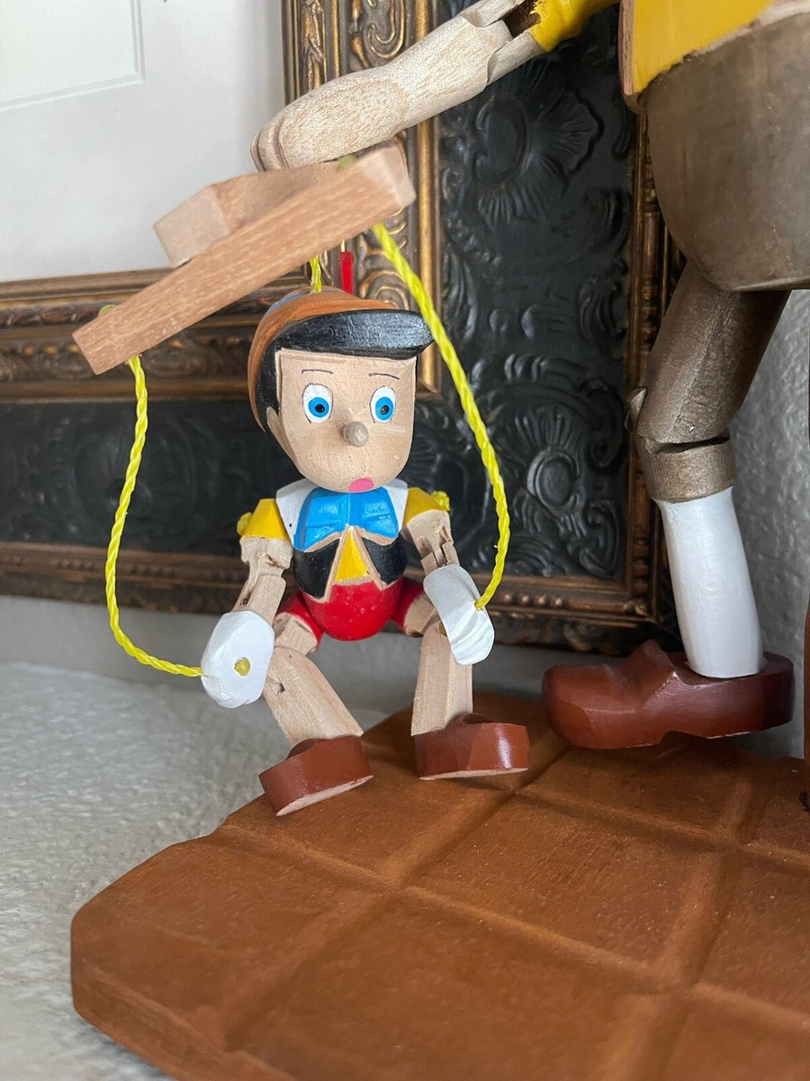 Pinocchio and Geppetto Hand carved and Painted Moveable Figurines