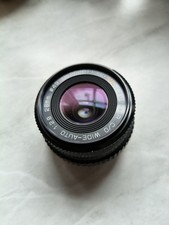 Soligor MC C/D Objektiv, Wide-Auto, 1:2.8/28mm + 49mm Skylight 1A