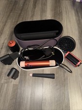 Dyson Airwrap i.d. multi-styler strawberry bronze/ blush pink used with case
