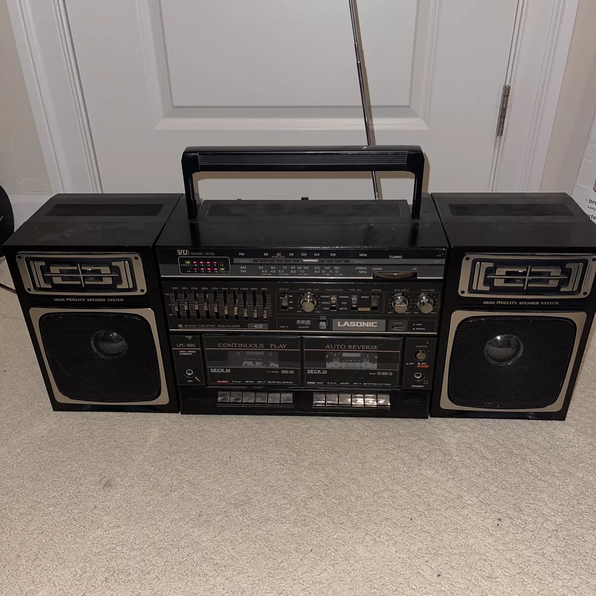 Boombox with cheap detachable speakers