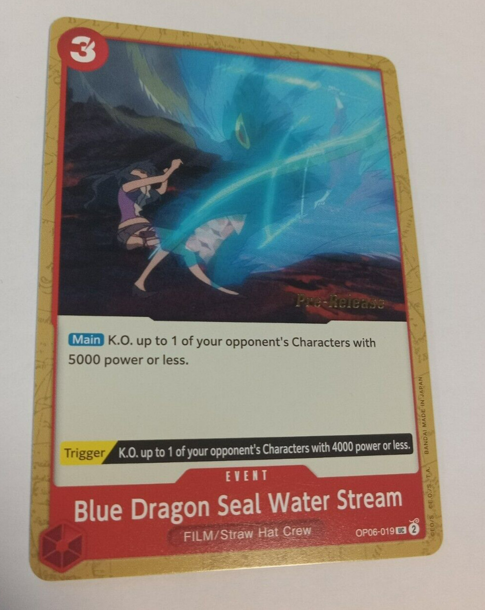 One Piece Game Blue Dragon Seal Water Stream Pre-Release OP06-019 NM