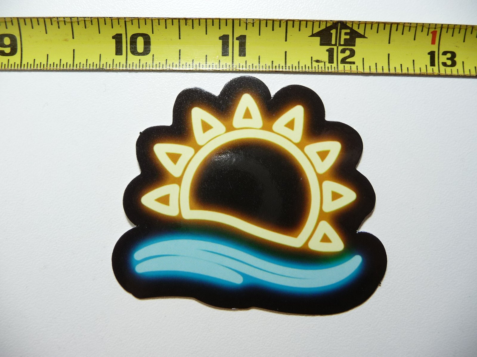 Vibrant Sunrise Over Water Neon Sticker Decal