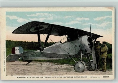 13121438 - American Aviator and his French Instructor Inspecting Battle Plane