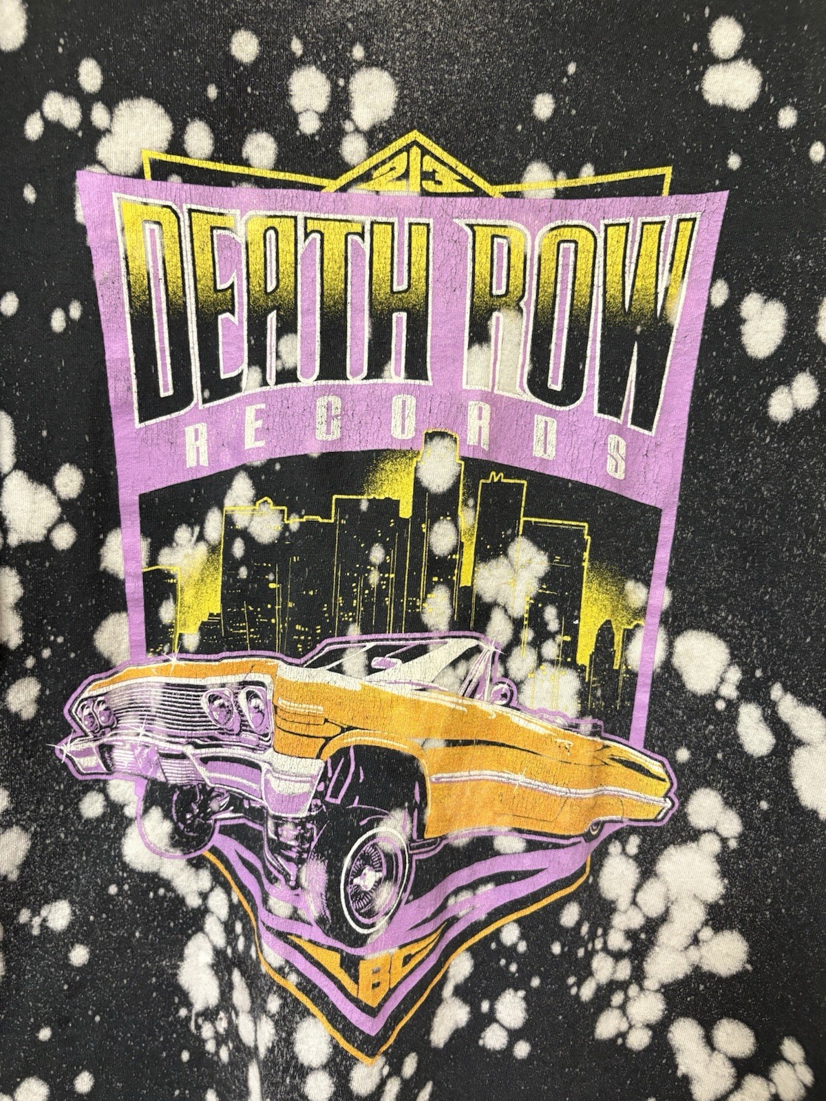 FILA Camicia manica corta auto retrò Death Row Records nera splatter candeggina. Grande XL.