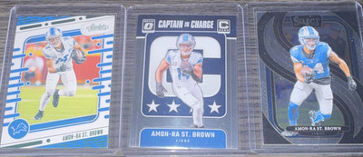 Panini NFL 2024 Amon-Ra St. Brown Lions 3-Card Lot Absolute Select Optic