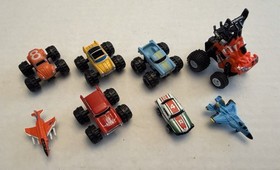 Vintage Micro Machines Lot Of 8 Mixed Cars, Monster Trucks, Jets