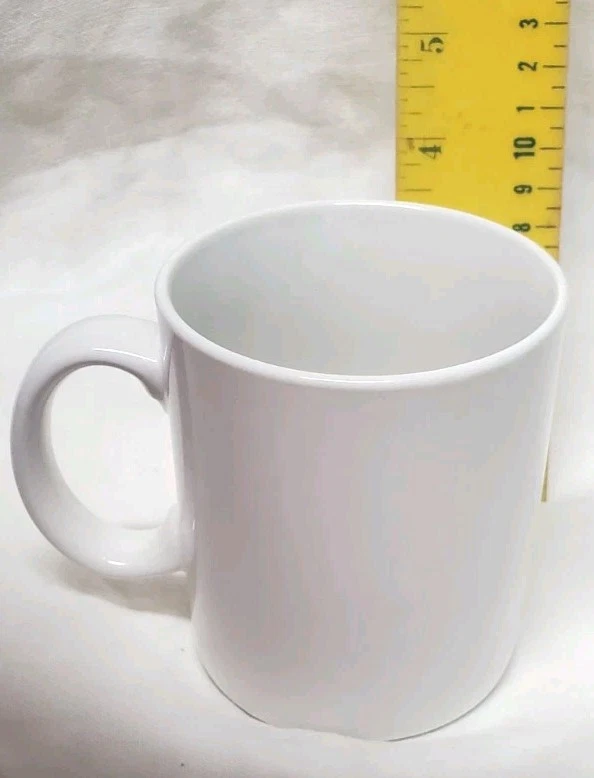 Taza de café Sam the Bald Eagle 1984 Juegos Olímpicos de Estados Unidos papel de hockey Foto 4 de 4