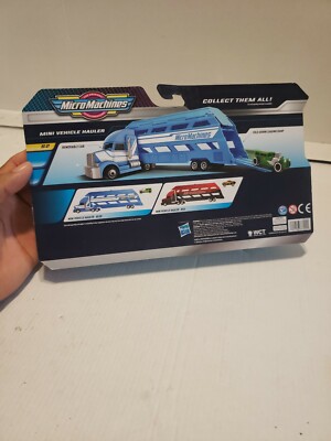 Micro Machines Mini Trasportatore Blue Hauler Con Veicolo Esclusivo - Giocattolo Per Bambini 4+
