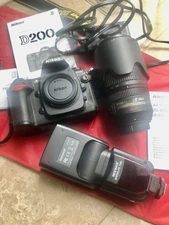 Nikon D200 camera With Nikon AF S VR 70-300mm And Speedlight