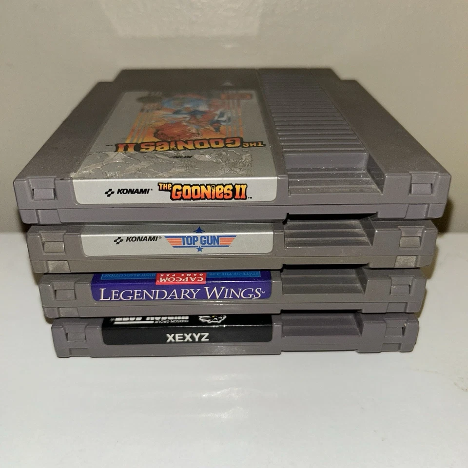 Lote de juegos retro vintage paquete Nintendo Sega Genesis Goonies Top Gun CARIDAD Foto 4 de 4