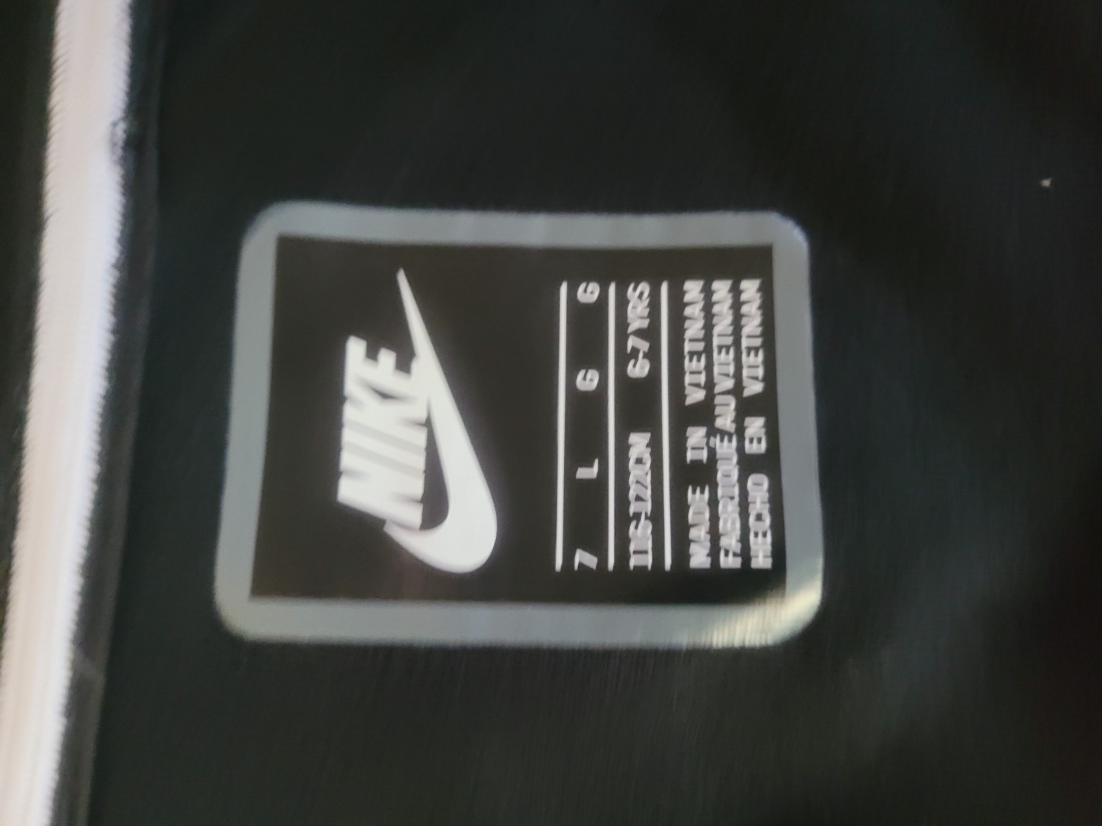 SACAI X NIKE Giacca leggera Nike ragazzo nera con cappuccio e zip taglia 7