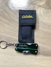 Cabelas Folding 6 multi-tool kit, w/case, flashlight, pliers, knife, opener, etc