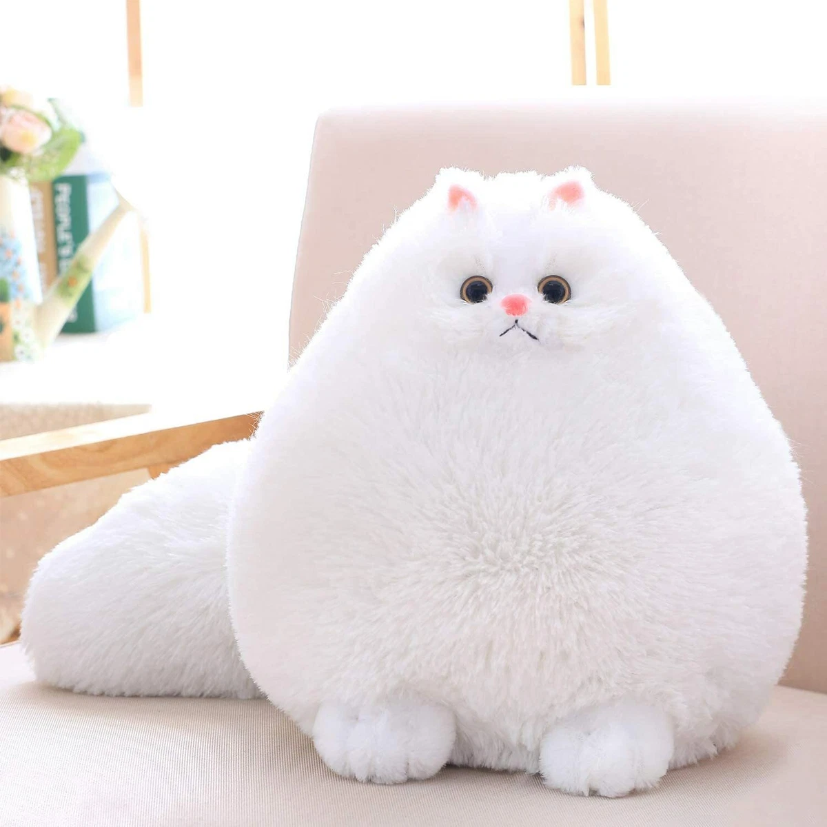 White cat toys top