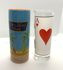 Lot of 2 Las Vegas Shot Glasses Mandalay Bay Tall Ceramic & Ace of Hearts Card