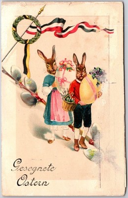 Gesegnete Ostern, Two Anthropomorphic Rabbits With Floral Easter Egg Postcard