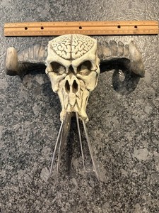 Skull Shaped Brain And Bone Decor With Knife Blades