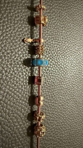 9x Pandora Charms 585er Gelbgold – Zeitlose Eleganz für Ihr Armband