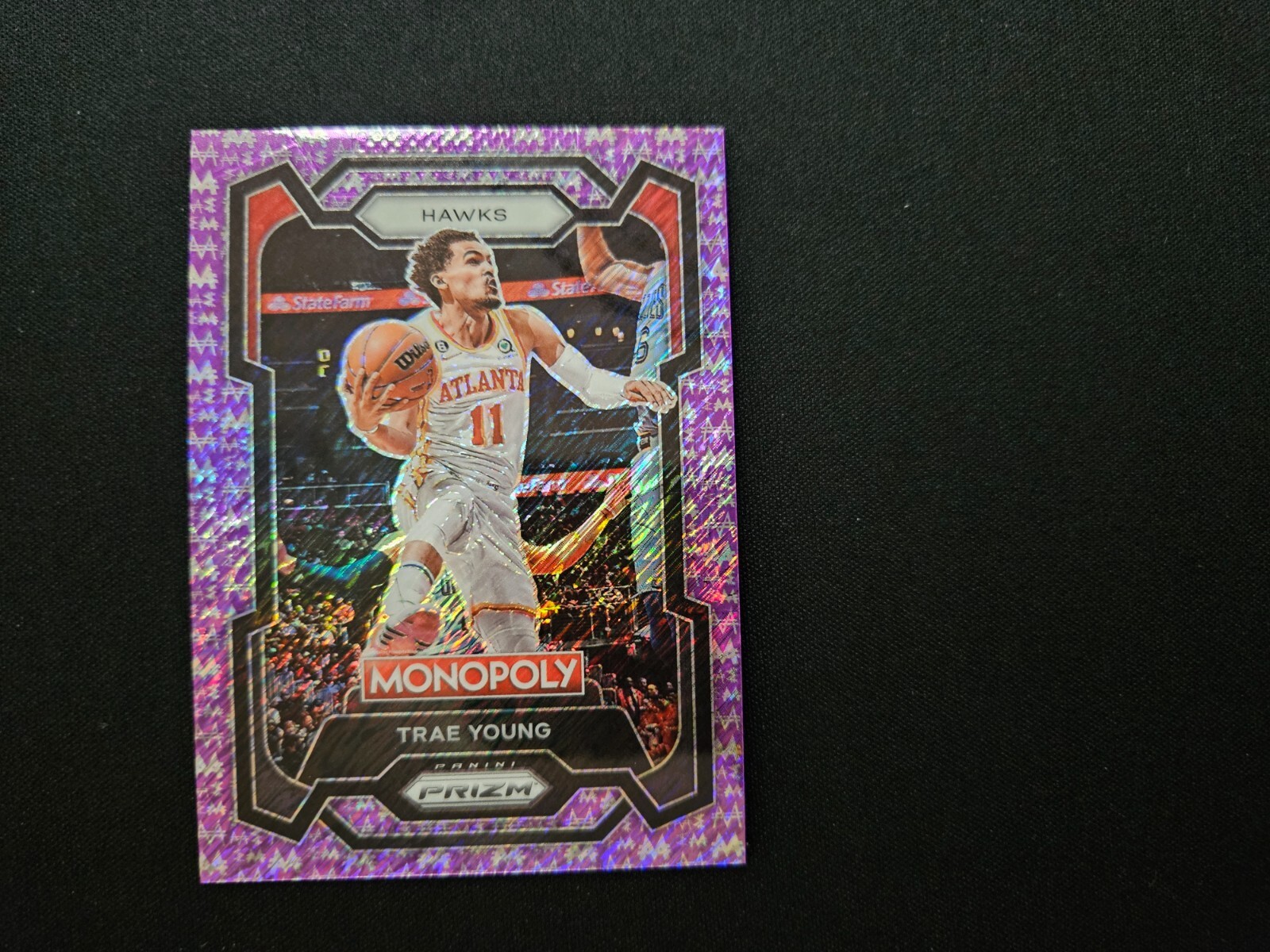 2023-24 Prizm Monopoly Millionaire Purple Shimmer #4 Trae Young /50 Hawks NBA