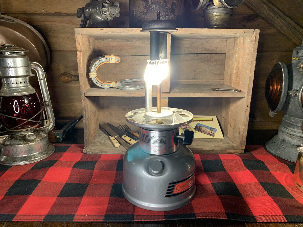 Coleman Powerhouse Dual Fuel ランタン usedです Amazon.com: Coleman Powerhouse Dual Fuel Lantern Shines up