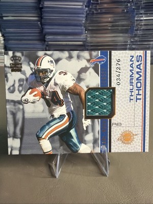 THURMAN THOMAS 2001 PACIFIC CROWN ROYALE GAME-WORN JERSEY PATCH #’D /276