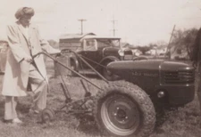 Woman Pushing Tractor David Bradley Machine Rural Scene Outdoors 1940s