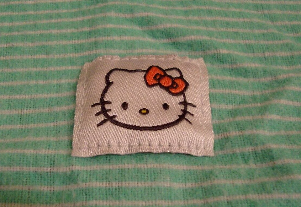 HELLO KITTY: Manta de Recepción Bebé Infante Verde + Blanco Rayas 26"x25" 508 Foto 2 de 2